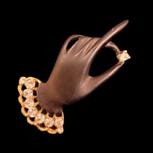 Elegant Black and Gold Hand Brooch